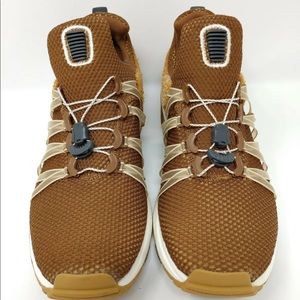 nike shox gravity elemental gold